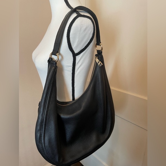 Michael Kors pebbled black leather slouch purse with fringe and emblem detail - Picture 4 of 6